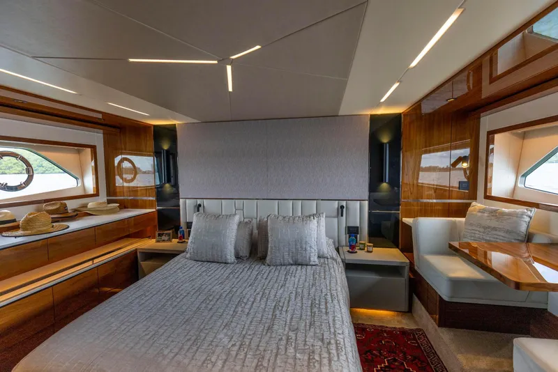 Slide: The Image of Luxurious bedroom interior of 2021 Sunseeker Manhattan 68 yacht with elegant wood finishes. - 47
