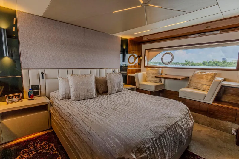 Slide: The Image of Luxurious bedroom interior of 2021 Sunseeker Manhattan 68 yacht with elegant furnishings. - 49