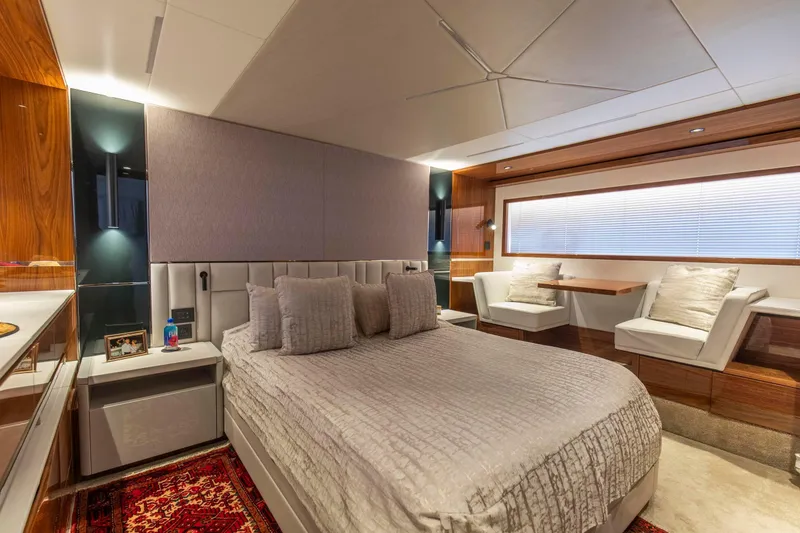 Slide: The Image of Luxurious bedroom interior of 2021 Sunseeker Manhattan 68 yacht with modern design and elegant furnishings. - 5