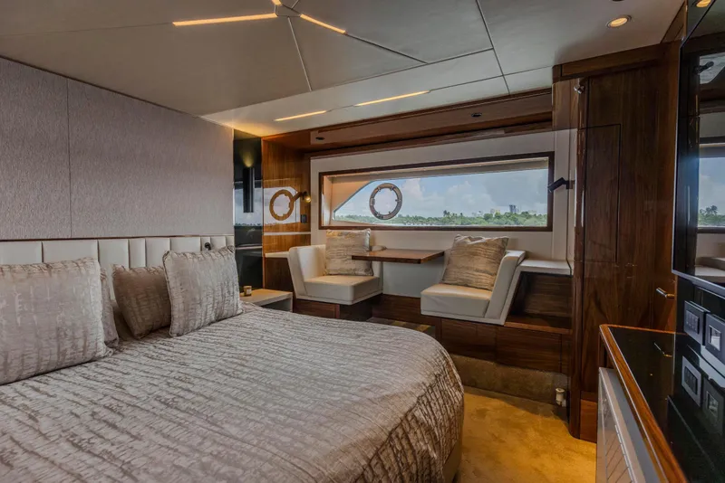 Slide: The Image of Luxurious interior of 2021 Sunseeker Manhattan 68 yacht with elegant bedroom and scenic window view. - 52