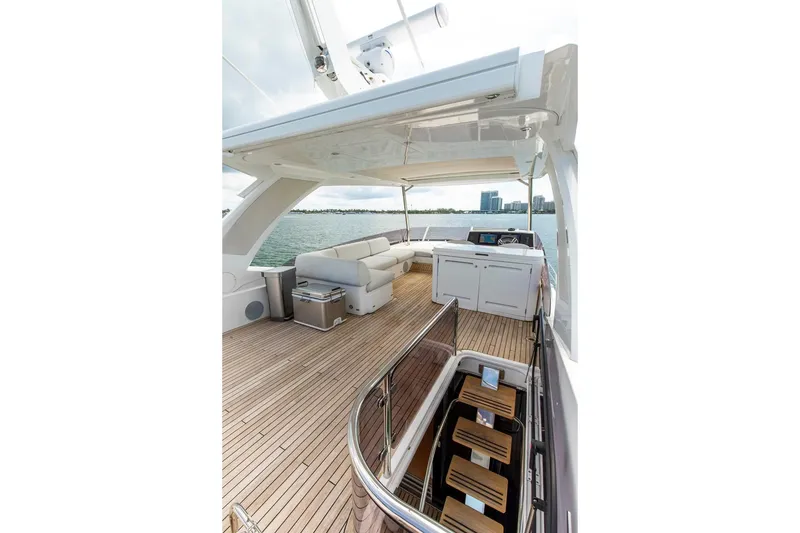 Slide: The Image of Luxurious Sunseeker Manhattan 68 yacht deck, 2021 model, featuring spacious seating and modern amenities. - 64