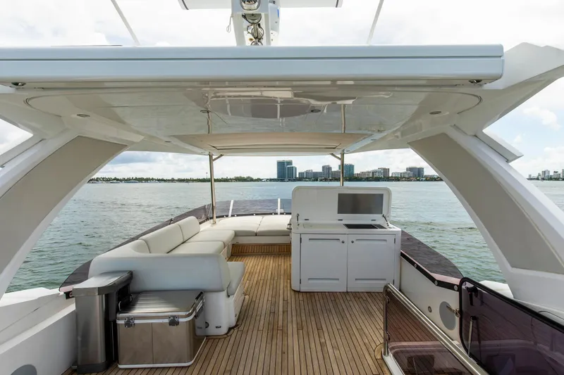 Slide: The Image of Luxurious 2021 Sunseeker Manhattan 68 yacht deck with seating and ocean view. - 73