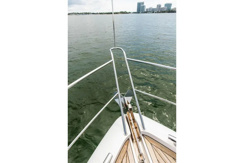 Slide: The Image of Bow view of 2021 Sunseeker Manhattan 68 yacht on calm water. - 84