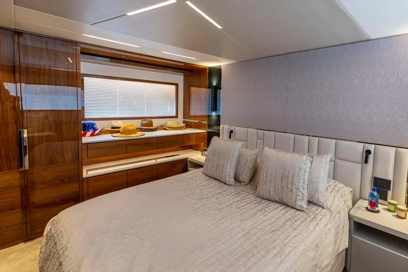 Slide: The Image of Luxurious bedroom interior of 2021 Sunseeker Manhattan 68 yacht with elegant decor. - 9