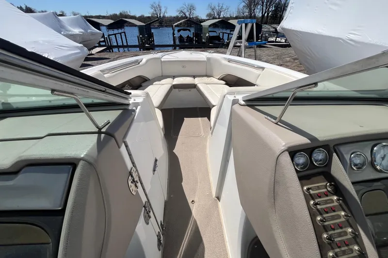 Slide: The Image of Interior view of a 2006 Cobalt 272 boat with seating and dashboard. - 20