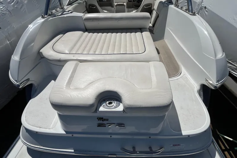 Slide: The Image of 2006 Cobalt 272 boat with white seating and spacious deck area. - 7