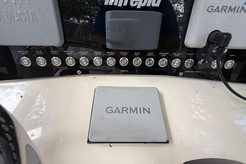 Slide: The Image of Control panel of a 2003 Intrepid 289 Center Console with Garmin navigation system. - 16