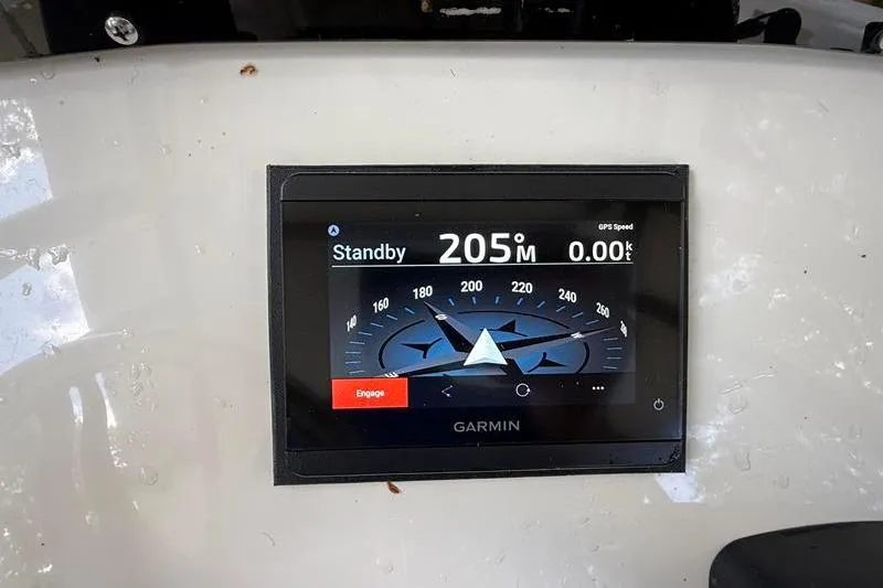 Slide: The Image of Garmin navigation display on 2003 Intrepid 289 Center Console boat dashboard. - 17