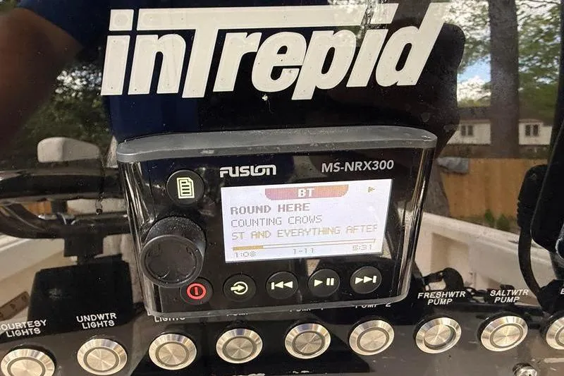Slide: The Image of Fusion MS-NRX300 stereo on 2003 Intrepid 289 Center Console boat dashboard. - 19