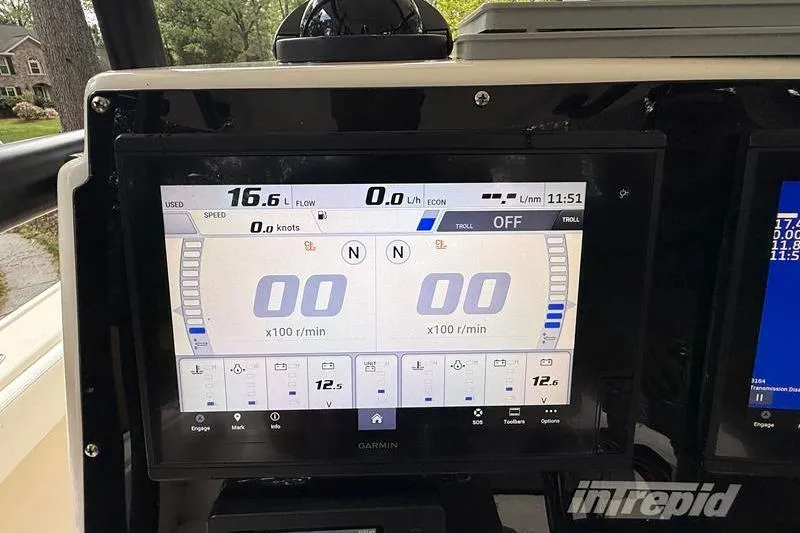 Slide: The Image of Garmin display on 2003 Intrepid 289 Center Console showing speed and engine data. - 21