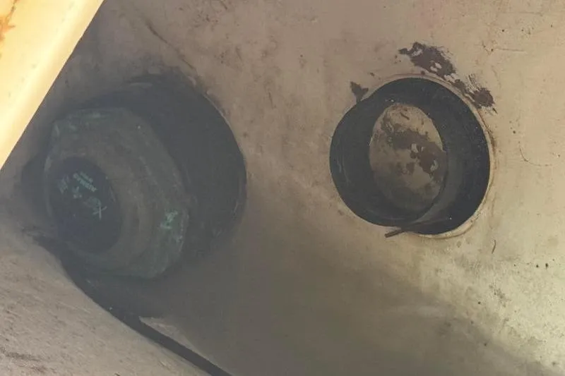 Slide: The Image of Close-up of a 2003 Intrepid 289 Center Console boat's hull fittings. - 26