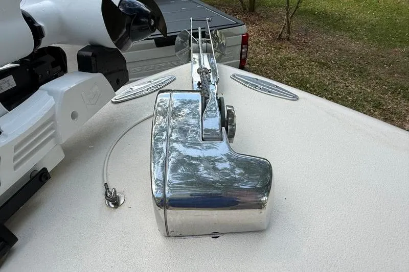 Slide: The Image of 2003 Intrepid 289 Center Console boat anchor and winch system on deck. - 35