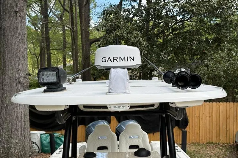 Slide: The Image of 2003 Intrepid 289 Center Console boat with Garmin radar and outdoor equipment. - 39