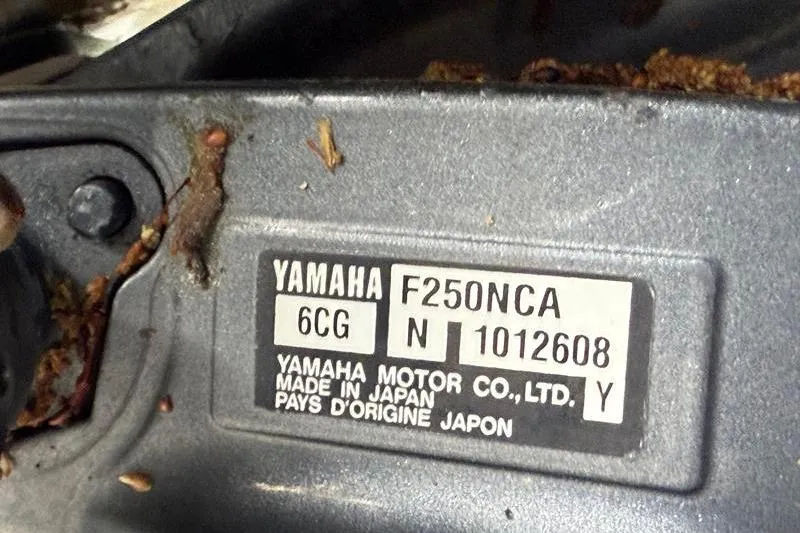 Slide: The Image of Yamaha F250NCA engine label on 2003 Intrepid 289 Center Console, made in Japan. - 43