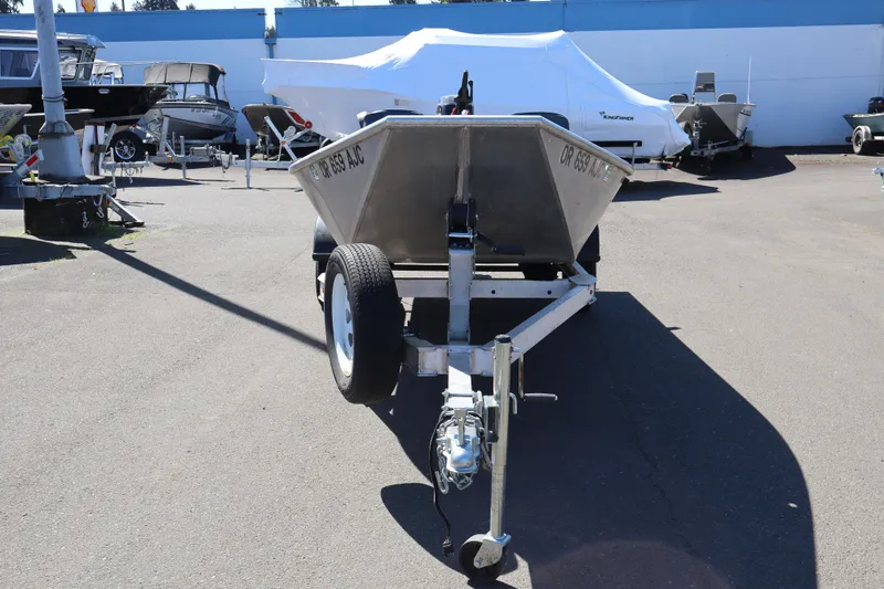 Slide: The Image of 1978 Alumaweld Flatbottom boat on trailer in outdoor lot. - 16