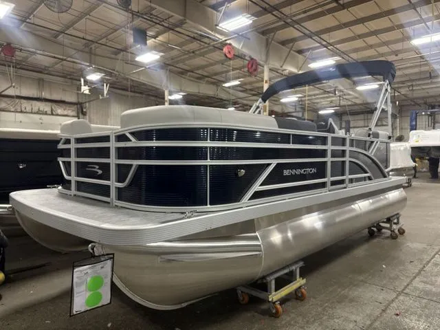 The Image of Bennington 20 S1SSR 2026 pontoon boat in warehouse. - 1