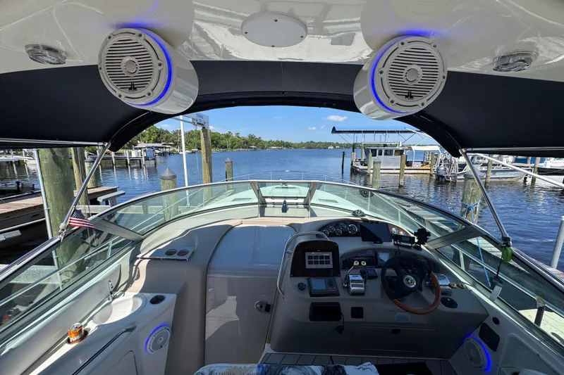 Slide: The Image of Cockpit view of 2001 Sea Ray 340 Sundancer yacht at marina. - 17