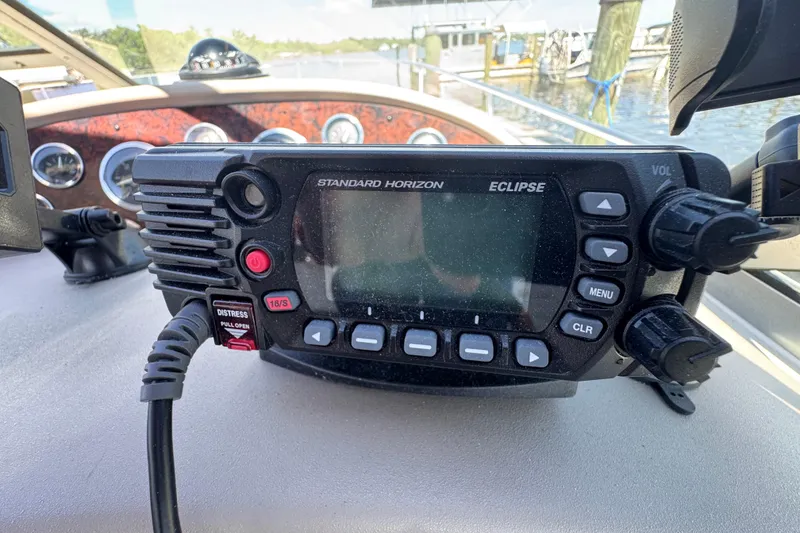 Slide: The Image of Standard Horizon Eclipse radio on 2001 Sea Ray 340 Sundancer boat dashboard. - 22