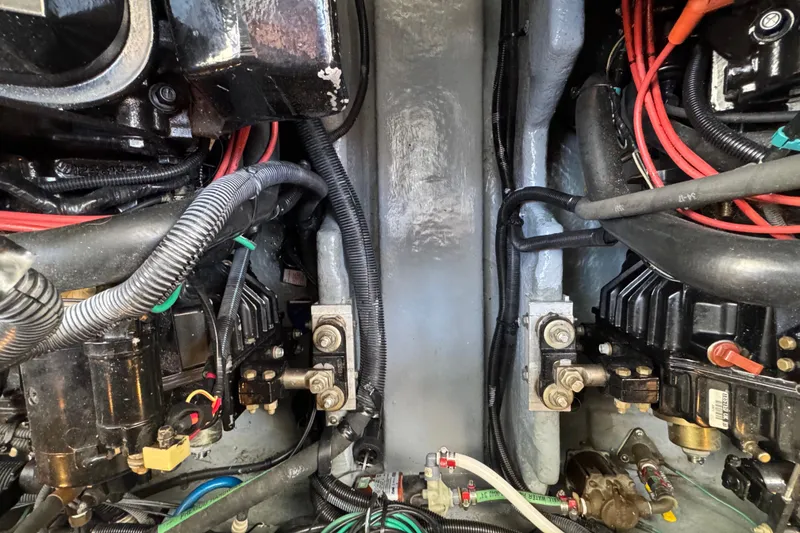 Slide: The Image of Engine compartment of a 2001 Sea Ray 340 Sundancer with visible wiring and components. - 39