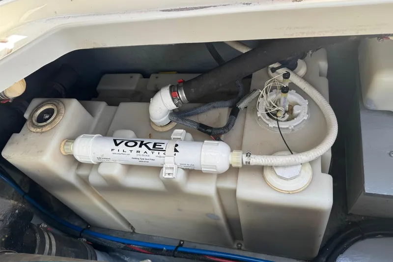 Slide: The Image of Engine compartment of a 2001 Sea Ray 340 Sundancer with VOKES filtration system. - 42