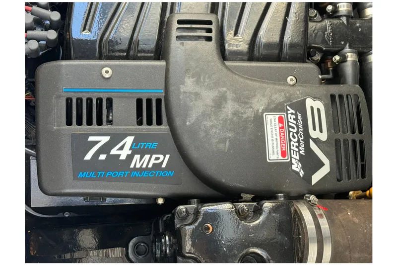 Slide: The Image of Engine of a 2001 Sea Ray 340 Sundancer with 7.4L MPI V8 Mercury MerCruiser. - 48