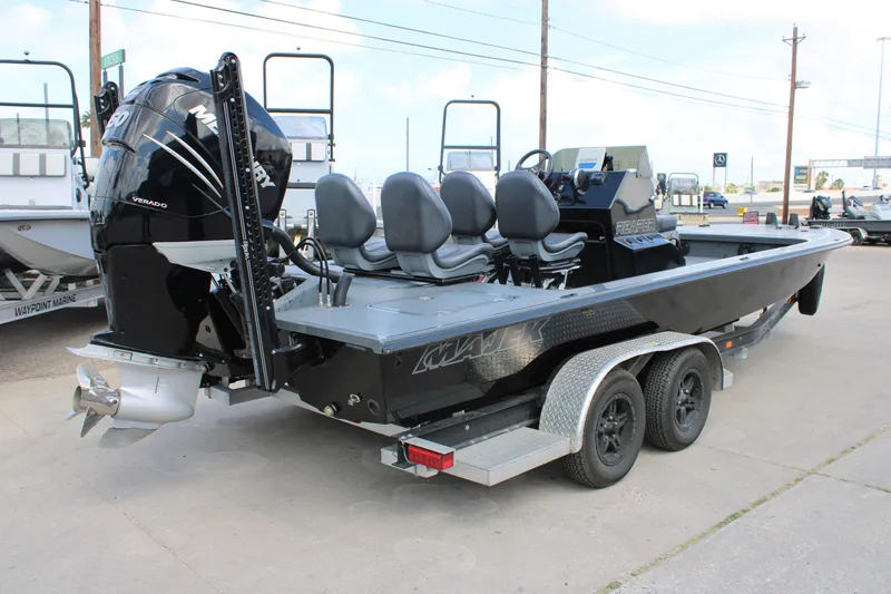 Slide: The Image of 2022 Majek 24 Reaper boat with Mercury Verado engine on trailer. - 4