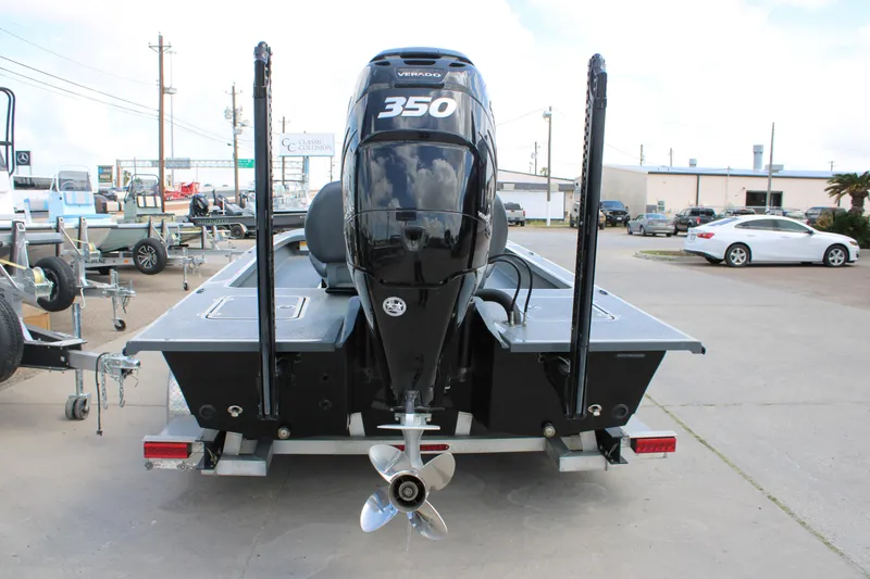 Slide: The Image of 2022 Majek 24 Reaper boat with powerful 350 engine on trailer. - 5