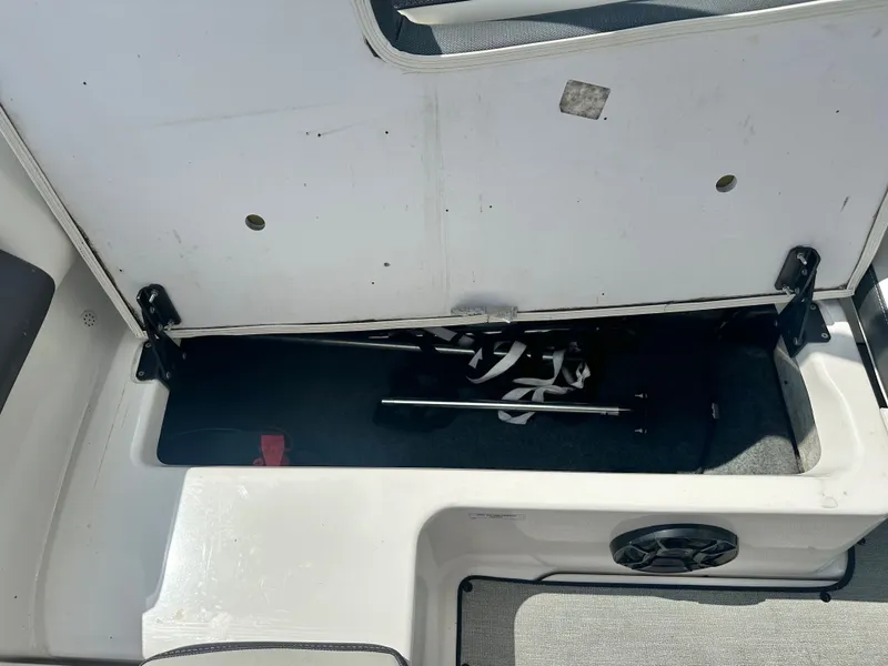 Slide: The Image of Storage compartment in 2022 Yamaha AR195 boat. - 22