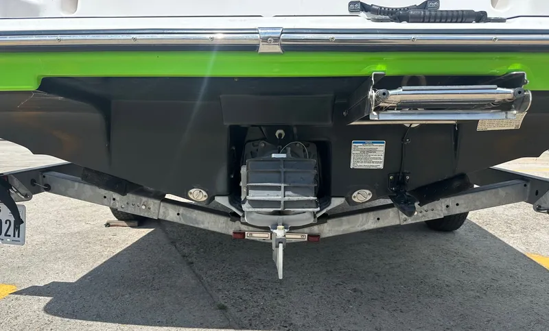 Slide: The Image of Rear view of a 2022 Yamaha AR195 boat on a trailer. - 5