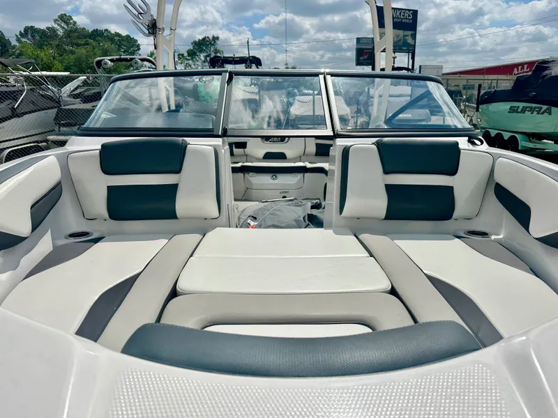 Slide: The Image of Interior of a 2022 Yamaha AR195 boat with seating area. - 6