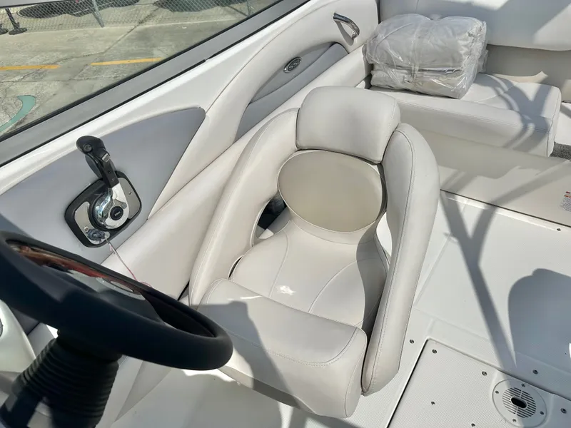 Slide: The Image of Interior of a 2008 Chaparral 210 SSi boat with white seating. - 14