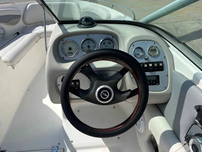 Slide: The Image of Interior view of a 2008 Chaparral 210 SSi boat cockpit. - 15