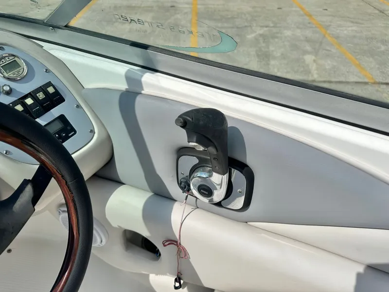 Slide: The Image of Interior view of a 2008 Chaparral 210 SSi boat with control console. - 18