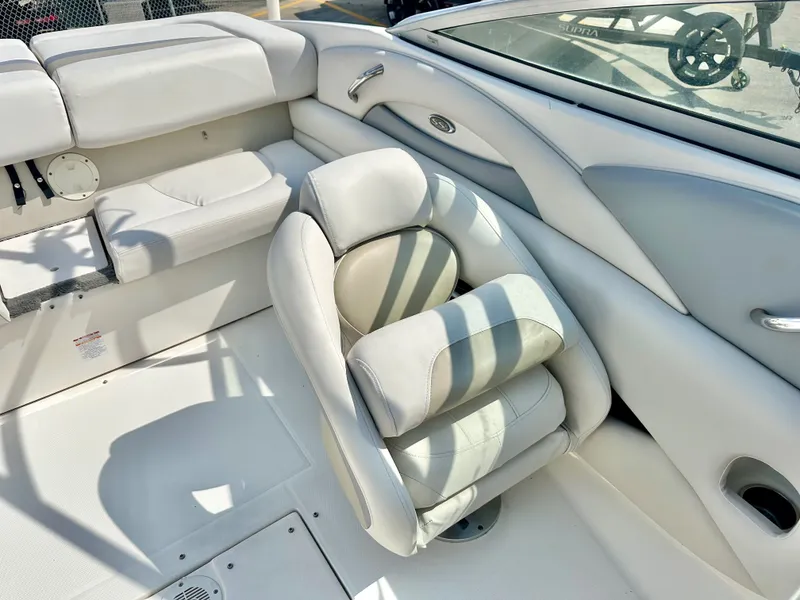 Slide: The Image of Interior of a 2008 Chaparral 210 SSi boat with white leather seats. - 20