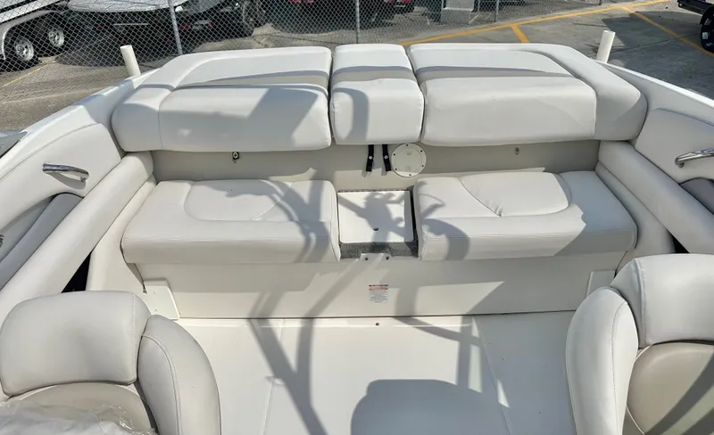 Slide: The Image of Interior of a 2008 Chaparral 210 SSi boat with white seating. - 28