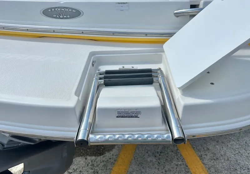 Slide: The Image of 2008 Chaparral 210 SSi boat with retractable swim ladder. - 6