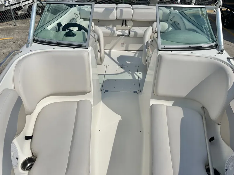 Slide: The Image of Interior of a 2008 Chaparral 210 SSi boat with white seating. - 9
