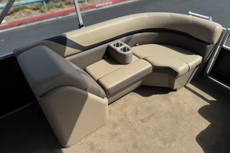 Slide: The Image of Luxurious seating on 2022 Bennington SX23 Salt Water Series pontoon boat with cup holders. - 19
