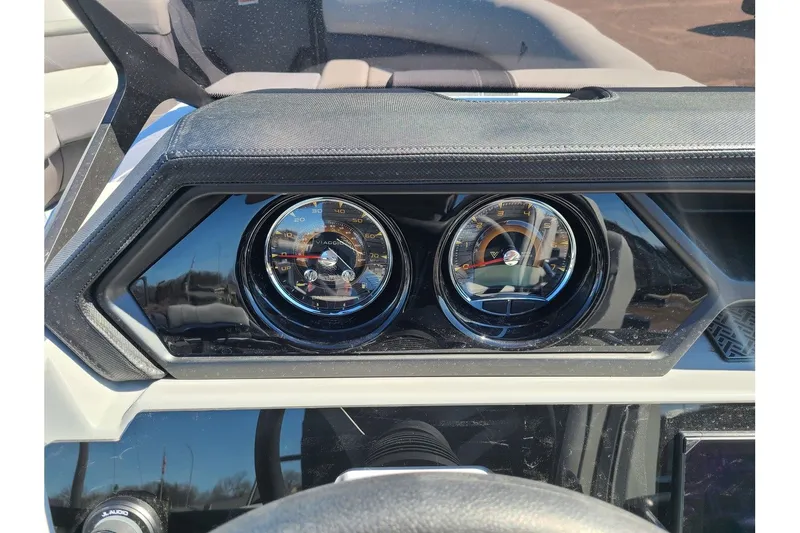 Slide: The Image of Dashboard of 2025 Viaggio Lago Z22Q with gauges. - 16