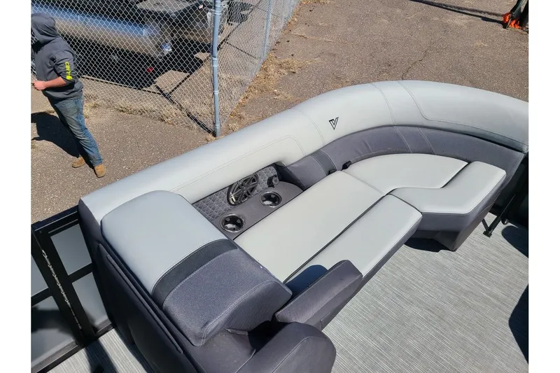 Slide: The Image of Viaggio Lago Z22Q 2025 with luxurious seating area and cup holders. - 20