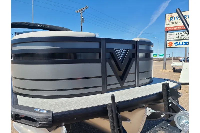 Slide: The Image of 2025 Viaggio Lago Z22Q pontoon boat on a trailer. - 3
