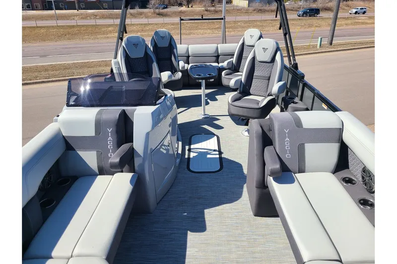 Slide: The Image of Interior of 2025 Viaggio Lago Z22Q pontoon boat with luxurious seating. - 4