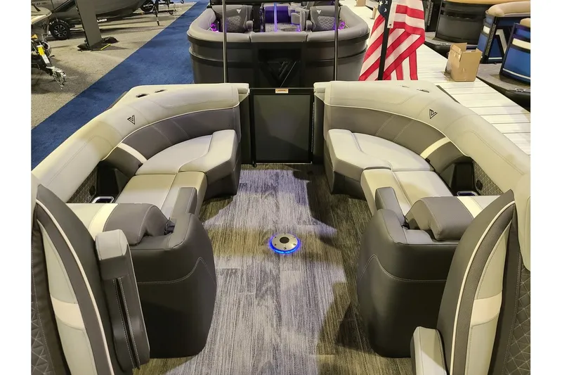 Slide: The Image of 2026 Viaggio Lago Z22U Tritoon interior with luxurious seating. - 10