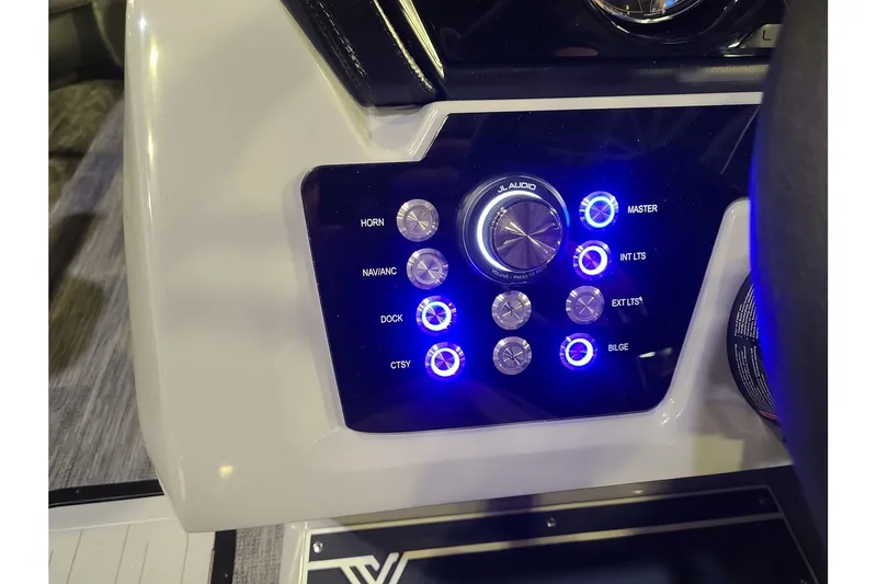 Slide: The Image of Viaggio Lago Z22U Tritoon control panel with illuminated buttons. - 17