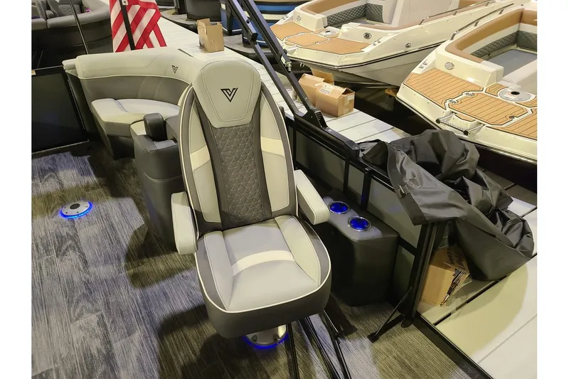 Slide: The Image of Viaggio Lago Z22U Tritoon with luxurious seating design, model year 2026. - 9