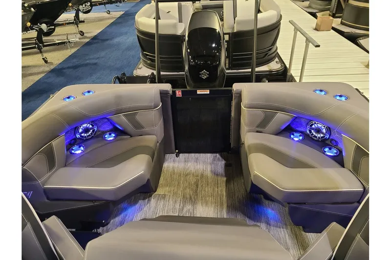 Slide: The Image of Interior of 2026 Viaggio Diamante 24Q Tritoon with blue LED lighting. - 11