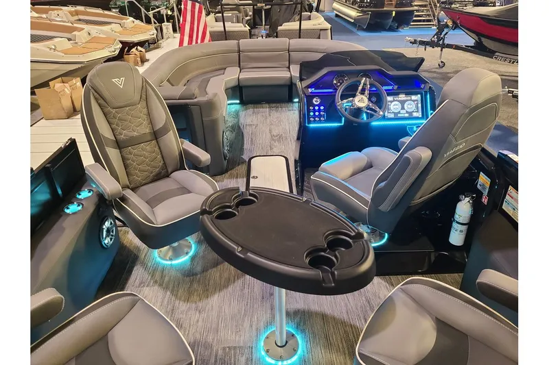 Slide: The Image of Interior of 2026 Viaggio Diamante 24Q Tritoon with luxurious seating and LED lighting. - 14