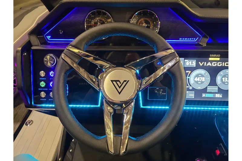 Slide: The Image of Viaggio Diamante 24Q Tritoon 2026 steering console with LED lighting. - 16