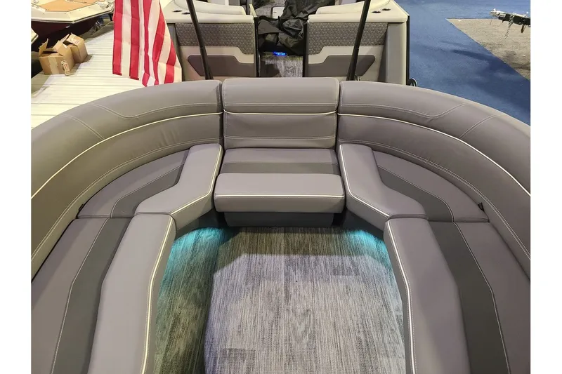 Slide: The Image of Interior of 2026 Viaggio Diamante 24Q Tritoon with gray seating. - 20
