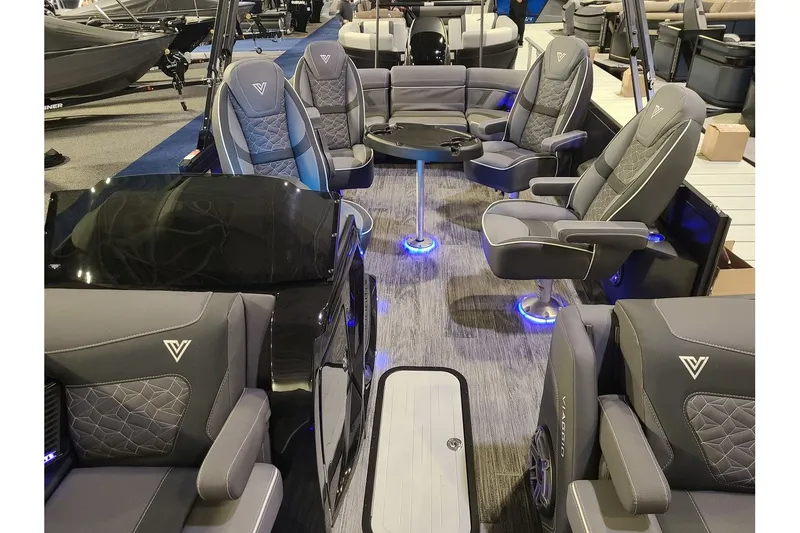 Slide: The Image of Interior of 2026 Viaggio Diamante 24Q Tritoon with luxurious seating. - 6